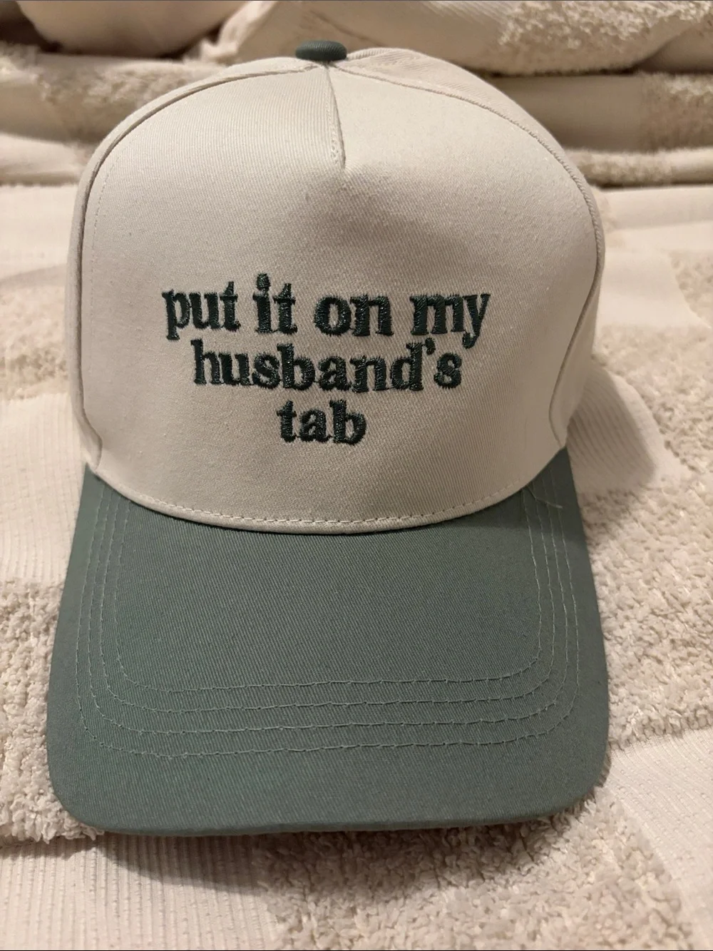 Put it on my husband’s tab hat